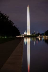 The Washington Monument seen through the Lincoln Memorial reflecting pools.
